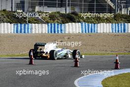 Nico Rosberg (GER) Mercedes AMG F1 W04 stops on the circuit with a small fire. 05.02.2013. Formula One Testing, Day One, Jerez, Spain.