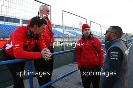 Lewis Hamilton (GBR) Mercedes AMG F1 with (L to R): Graeme Lowdon (GBR) Marussia F1 Team Chief Executive Officer, John Booth (GBR) Marussia F1 Team Team Principal and Marc Hynes (GBR) Marussia F1 Team Driver Coach. 05.02.2013. Formula One Testing, Day One, Jerez, Spain.