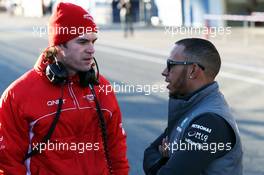 (L to R): Marc Hynes (GBR) Marussia F1 Team Driver Coach with Lewis Hamilton (GBR) Mercedes AMG F1. 05.02.2013. Formula One Testing, Day One, Jerez, Spain.