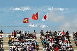 Fans and Ferrari flags. 11.10.2013. Formula 1 World Championship, Rd 15, Japanese Grand Prix, Suzuka, Japan, Practice Day.