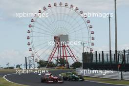 Felipe Massa (BRA) Ferrari F138 and Giedo van der Garde (NLD) Caterham CT03. 11.10.2013. Formula 1 World Championship, Rd 15, Japanese Grand Prix, Suzuka, Japan, Practice Day.