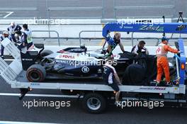 The Williams FW35 of Pastor Maldonado (VEN) Williams is recovered back to the pits on the back of a truck after crashing in the second practice session. 11.10.2013. Formula 1 World Championship, Rd 15, Japanese Grand Prix, Suzuka, Japan, Practice Day.