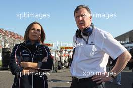 (L to R): Claire Williams (GBR) Williams Deputy Team Principal with Mike O'Driscoll (GBR) Williams Group CEO on the grid. 13.10.2013. Formula 1 World Championship, Rd 15, Japanese Grand Prix, Suzuka, Japan, Race Day.