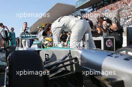 Lewis Hamilton (GBR) Mercedes AMG F1 W04 on the grid. 13.10.2013. Formula 1 World Championship, Rd 15, Japanese Grand Prix, Suzuka, Japan, Race Day.