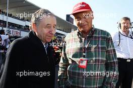 (L to R): Jean Todt (FRA) FIA President with Niki Lauda (AUT) Mercedes Non-Executive Chairman on the grid. 13.10.2013. Formula 1 World Championship, Rd 15, Japanese Grand Prix, Suzuka, Japan, Race Day.