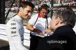 (L to R): Jules Bianchi (FRA) Marussia F1 Team with Jean Todt (FRA) FIA President on the grid. 13.10.2013. Formula 1 World Championship, Rd 15, Japanese Grand Prix, Suzuka, Japan, Race Day.