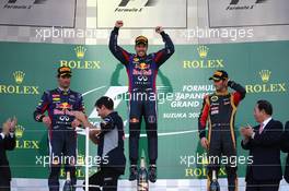 1st place Sebastian Vettel (GER) Red Bull Racing, 2nd place Mark Webber (AUS) Red Bull Racing RB9 and 3rd place Romain Grosjean (FRA) Lotus F1 Team. 13.10.2013. Formula 1 World Championship, Rd 15, Japanese Grand Prix, Suzuka, Japan, Race Day.