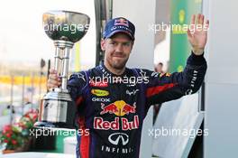 Race winner Sebastian Vettel (GER) Red Bull Racing celebrates on the podium. 13.10.2013. Formula 1 World Championship, Rd 15, Japanese Grand Prix, Suzuka, Japan, Race Day.