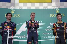 The podium (L to R): Mark Webber (AUS) Red Bull Racing, second; Sebastian Vettel (GER) Red Bull Racing, race winner; Romain Grosjean (FRA) Lotus F1 Team, third. 13.10.2013. Formula 1 World Championship, Rd 15, Japanese Grand Prix, Suzuka, Japan, Race Day.