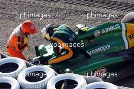 Giedo van der Garde (NLD) Caterham CT03 crashed out at the start of the race. 13.10.2013. Formula 1 World Championship, Rd 15, Japanese Grand Prix, Suzuka, Japan, Race Day.