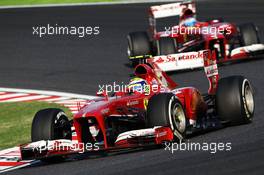 Felipe Massa (BRA) Ferrari F138 leads team mate Fernando Alonso (ESP) Ferrari F138. 13.10.2013. Formula 1 World Championship, Rd 15, Japanese Grand Prix, Suzuka, Japan, Race Day.