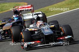 Nico Hulkenberg (GER) Sauber C32 leads Daniel Ricciardo (AUS) Scuderia Toro Rosso STR8. 12.10.2013. Formula 1 World Championship, Rd 15, Japanese Grand Prix, Suzuka, Japan, Qualifying Day.
