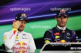 (L to R): Sebastian Vettel (GER) Red Bull Racing with team mate Mark Webber (AUS) Red Bull Racing in the FIA Press Conference. 12.10.2013. Formula 1 World Championship, Rd 15, Japanese Grand Prix, Suzuka, Japan, Qualifying Day.