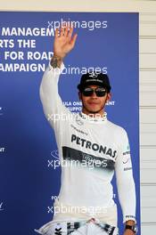 Lewis Hamilton (GBR) Mercedes AMG F1 celebrates his third position in parc ferme. 12.10.2013. Formula 1 World Championship, Rd 15, Japanese Grand Prix, Suzuka, Japan, Qualifying Day.