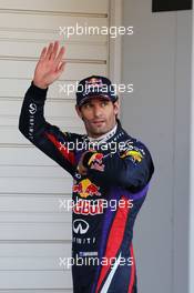 Mark Webber (AUS) Red Bull Racing celebrates his pole position in parc ferme. 12.10.2013. Formula 1 World Championship, Rd 15, Japanese Grand Prix, Suzuka, Japan, Qualifying Day.