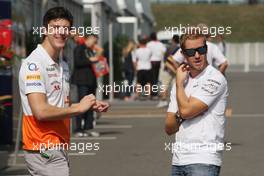 (L to R): James Calado (GBR) Sahara Force India Third Driver with Sam Bird (GBR) Mercedes AMG F1 Test And Reserve Driver. 12.10.2013. Formula 1 World Championship, Rd 15, Japanese Grand Prix, Suzuka, Japan, Qualifying Day.