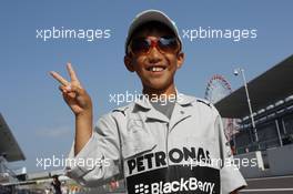 A young Mercedes AMG F1 fan. 12.10.2013. Formula 1 World Championship, Rd 15, Japanese Grand Prix, Suzuka, Japan, Qualifying Day.