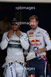 Lewis Hamilton (GBR) Mercedes AMG F1 and Sebastian Vettel (GER) Red Bull Racing. 12.10.2013. Formula 1 World Championship, Rd 15, Japanese Grand Prix, Suzuka, Japan, Qualifying Day.