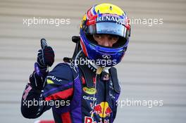 Mark Webber (AUS) Red Bull Racing celebrates his pole position in parc ferme. 12.10.2013. Formula 1 World Championship, Rd 15, Japanese Grand Prix, Suzuka, Japan, Qualifying Day.