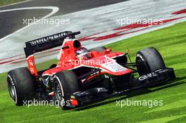 Jules Bianchi (FRA) Marussia F1 Team MR02 runs wide. 12.10.2013. Formula 1 World Championship, Rd 15, Japanese Grand Prix, Suzuka, Japan, Qualifying Day.