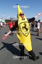 A Ferrari fan dressed as a banana. 13.10.2013. Formula 1 World Championship, Rd 15, Japanese Grand Prix, Suzuka, Japan, Race Day.