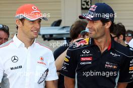 (L to R): Jenson Button (GBR) McLaren with Mark Webber (AUS) Red Bull Racing. 13.10.2013. Formula 1 World Championship, Rd 15, Japanese Grand Prix, Suzuka, Japan, Race Day.