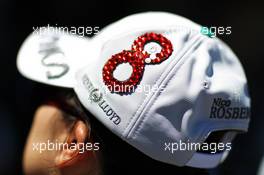 A Nico Rosberg (GER) Mercedes AMG F1 cap worn by a fan. 10.10.2013. Formula 1 World Championship, Rd 15, Japanese Grand Prix, Suzuka, Japan, Preparation Day.