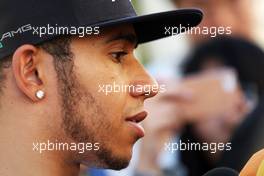 Lewis Hamilton (GBR) Mercedes AMG F1 with the media. 10.10.2013. Formula 1 World Championship, Rd 15, Japanese Grand Prix, Suzuka, Japan, Preparation Day.