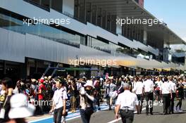 Fans in the pits. 10.10.2013. Formula 1 World Championship, Rd 15, Japanese Grand Prix, Suzuka, Japan, Preparation Day.