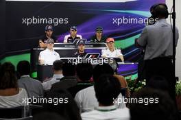 The FIA Press Conference (From back row (L to R)): Jean-Eric Vergne (FRA) Scuderia Toro Rosso; Pastor Maldonado (VEN) Williams; Charles Pic (FRA) Caterham; Nico Hulkenberg (GER) Sauber; Sebastian Vettel (GER) Red Bull Racing; Jenson Button (GBR) McLaren.  10.10.2013. Formula 1 World Championship, Rd 15, Japanese Grand Prix, Suzuka, Japan, Preparation Day.