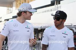 (L to R): Nico Rosberg (GER) Mercedes AMG F1 with team mate Lewis Hamilton (GBR) Mercedes AMG F1. 10.10.2013. Formula 1 World Championship, Rd 15, Japanese Grand Prix, Suzuka, Japan, Preparation Day.