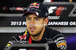 Sebastian Vettel (GER) Red Bull Racing in the FIA Press Conference. 10.10.2013. Formula 1 World Championship, Rd 15, Japanese Grand Prix, Suzuka, Japan, Preparation Day.