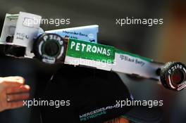 A Mercedes AMG F1 on a fans' cap. 10.10.2013. Formula 1 World Championship, Rd 15, Japanese Grand Prix, Suzuka, Japan, Preparation Day.