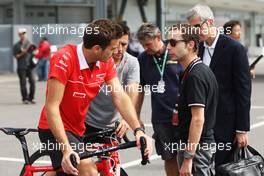 (L to R): Jules Bianchi (FRA) Marussia F1 Team with Nicolas Todt (FRA) Driver Manager. 10.10.2013. Formula 1 World Championship, Rd 15, Japanese Grand Prix, Suzuka, Japan, Preparation Day.