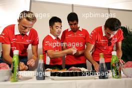 (L to R): Max Chilton (GBR) Marussia F1 Team; Rodolfo Gonzalez (VEN) Marussia F1 Team Reserve Driver and Jules Bianchi (FRA) Marussia F1 Team at a team sushi event. 10.10.2013. Formula 1 World Championship, Rd 15, Japanese Grand Prix, Suzuka, Japan, Preparation Day.