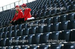 Volunteers in the grandstand. 04.10.2013. Formula 1 World Championship, Rd 14, Korean Grand Prix, Yeongam, South Korea, Practice Day.