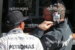 (L to R): Lewis Hamilton (GBR) Mercedes AMG F1 with Ross Brawn (GBR) Mercedes AMG F1 Team Principal. 04.10.2013. Formula 1 World Championship, Rd 14, Korean Grand Prix, Yeongam, South Korea, Practice Day.