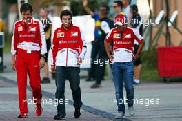 (L to R): Massimo Rivola (ITA) Ferrari Sporting Director with Fernando Alonso (ESP) Ferrari and Felipe Massa (BRA) Ferrari. 04.10.2013. Formula 1 World Championship, Rd 14, Korean Grand Prix, Yeongam, South Korea, Practice Day.