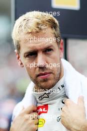 Sebastian Vettel (GER) Red Bull Racing on the grid. 06.10.2013. Formula 1 World Championship, Rd 14, Korean Grand Prix, Yeongam, South Korea, Race Day.