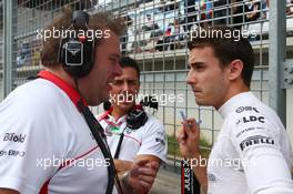 Jules Bianchi (FRA) Marussia F1 Team with Dave Greenwood (GBR) Marussia F1 Team Race Engineer on the grid. 06.10.2013. Formula 1 World Championship, Rd 14, Korean Grand Prix, Yeongam, South Korea, Race Day.
