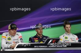 The post race FIA Press Conference (L to R): Kimi Raikkonen (FIN) Lotus F1 Team, second; Sebastian Vettel (GER) Red Bull Racing, race winner; Romain Grosjean (FRA) Lotus F1 Team, third. 06.10.2013. Formula 1 World Championship, Rd 14, Korean Grand Prix, Yeongam, South Korea, Race Day.