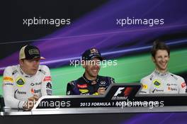 The post race FIA Press Conference (L to R): Kimi Raikkonen (FIN) Lotus F1 Team, second; Sebastian Vettel (GER) Red Bull Racing, race winner; Romain Grosjean (FRA) Lotus F1 Team, third. 06.10.2013. Formula 1 World Championship, Rd 14, Korean Grand Prix, Yeongam, South Korea, Race Day.