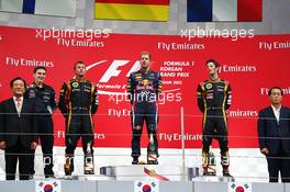 The podium (L to R): Kimi Raikkonen (FIN) Lotus F1 Team, second; Sebastian Vettel (GER) Red Bull Racing, race winner; Romain Grosjean (FRA) Lotus F1 Team, third. 06.10.2013. Formula 1 World Championship, Rd 14, Korean Grand Prix, Yeongam, South Korea, Race Day.