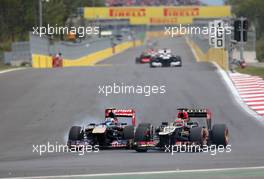 Daniel Ricciardo (AUS), Scuderia Toro Rosso and Kimi Raikkonen (FIN), Lotus F1 Team  06.10.2013. Formula 1 World Championship, Rd 14, Korean Grand Prix, Yeongam, South Korea, Race Day.