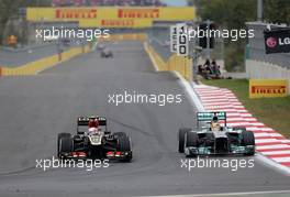 Romain Grosjean (FRA), Lotus F1 Team and Lewis Hamilton (GBR), Mercedes Grand Prix  06.10.2013. Formula 1 World Championship, Rd 14, Korean Grand Prix, Yeongam, South Korea, Race Day.