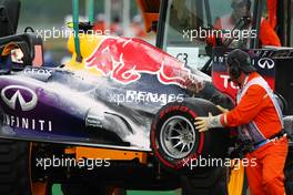 The fire damaged Red Bull Racing RB9 of race retiree Mark Webber (AUS) Red Bull Racing. 06.10.2013. Formula 1 World Championship, Rd 14, Korean Grand Prix, Yeongam, South Korea, Race Day.