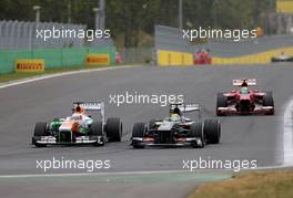 Paul di Resta (GBR), Force India Formula One Team and Esteban Gutierrez (MEX), Sauber F1 Team  06.10.2013. Formula 1 World Championship, Rd 14, Korean Grand Prix, Yeongam, South Korea, Race Day.