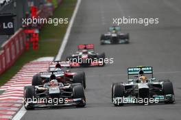 Nico Hulkenberg (GER) Sauber C32 and Lewis Hamilton (GBR) Mercedes AMG F1 W04. 06.10.2013. Formula 1 World Championship, Rd 14, Korean Grand Prix, Yeongam, South Korea, Race Day.
