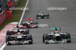 Nico Hulkenberg (GER) Sauber and Lewis Hamilton (GBR) Mercedes AMG F1. 06.10.2013. Formula 1 World Championship, Rd 14, Korean Grand Prix, Yeongam, South Korea, Race Day.