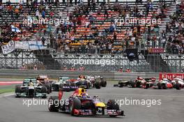 Sebastian Vettel (GER) Red Bull Racing RB9 leads at the start of the race. 06.10.2013. Formula 1 World Championship, Rd 14, Korean Grand Prix, Yeongam, South Korea, Race Day.